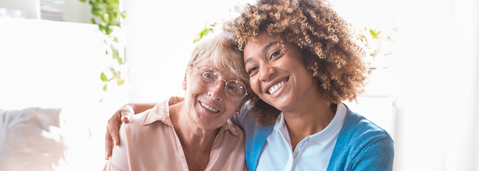 happy elderly woman and nurse